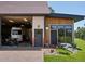 Exterior showcasing the attached garage, dual entry doors, and drought-tolerant landscaping at 8387 N Sunburst Trl, Parker, CO 80134