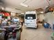 Spacious garage featuring an ATV and van, providing ample storage and parking at 8387 N Sunburst Trl, Parker, CO 80134