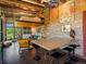 Unique living space with loft bed, exposed brick, and open layout, perfect for entertaining at 8387 N Sunburst Trl, Parker, CO 80134