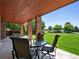 Charming patio with brick columns and an outdoor dining area at 8387 N Sunburst Trl, Parker, CO 80134