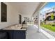 Inviting back patio with comfortable seating, ideal for outdoor relaxation and gatherings in a serene setting at 1369 E Witherspoon Dr, Elizabeth, CO 80107