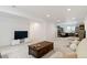 Large finished basement with ample space, neutral tones, and natural light at 1369 E Witherspoon Dr, Elizabeth, CO 80107