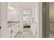Bright ensuite bathroom leading to the main bedroom at 1369 E Witherspoon Dr, Elizabeth, CO 80107