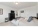 Cozy bedroom with neutral decor, natural light, and an access door at 1369 E Witherspoon Dr, Elizabeth, CO 80107
