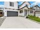 Beautiful two-story home with a large driveway and an attached two-car garage, enhancing curb appeal at 1369 E Witherspoon Dr, Elizabeth, CO 80107
