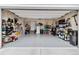 Spacious garage with epoxy flooring, ample storage, and a clean, organized layout at 1369 E Witherspoon Dr, Elizabeth, CO 80107