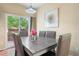 Cozy dining room featuring stylish decor, a modern light fixture, and a view to the backyard at 9138 Gale Blvd # 2, Thornton, CO 80260