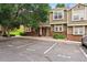 Townhome exterior with brick accents, two stories, front parking, and landscaping at 9138 Gale Blvd # 2, Thornton, CO 80260
