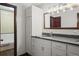 Bathroom with double vanity and marble countertops at 6145 S Perry Park Rd, Sedalia, CO 80135