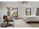 Spacious bedroom with views and sitting area at 6145 S Perry Park Rd, Sedalia, CO 80135
