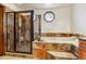 Bathroom features shower stall and soaking tub at 5797 S Laredo Ct, Centennial, CO 80015