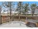 Outdoor deck with built-in hot tub and views of trees at 5797 S Laredo Ct, Centennial, CO 80015
