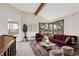 Bright living room with large windows and vaulted ceilings, well-lit and airy at 5797 S Laredo Ct, Centennial, CO 80015