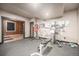 Well-equipped home workout room with exercise equipment and open space at 10145 Deerfield St, Firestone, CO 80504