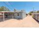 Exterior of a cozy home featuring a covered patio, concrete driveway, and fenced yard at 7291 Bryant St, Westminster, CO 80030