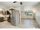 Open kitchen and living area showcasing modern appliances at 7291 Bryant St, Westminster, CO 80030