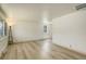 Spacious living room with laminate floors and ample natural light at 7291 Bryant St, Westminster, CO 80030