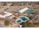 Aerial view of a recreation center featuring tennis courts, pools, and modern facilities at 9810 Mulberry Way, Highlands Ranch, CO 80129