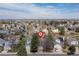 Aerial view of the neighborhood, showcasing well-maintained homes and mature trees at 6431 Freeport Dr, Highlands Ranch, CO 80130