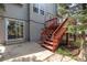Backyard with a sliding glass door, stairs to the deck, and a patio at 6431 Freeport Dr, Highlands Ranch, CO 80130
