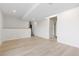 Spacious finished basement featuring built-in cabinets and easy access to the bathroom and upper floors at 6431 Freeport Dr, Highlands Ranch, CO 80130