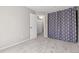 Bedroom featuring neutral paint, carpet and window with curtains at 6431 Freeport Dr, Highlands Ranch, CO 80130