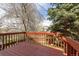 Wooden deck showcasing views of the lush surroundings at 6431 Freeport Dr, Highlands Ranch, CO 80130
