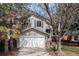 Charming two-story home with a two-car garage and beautifully landscaped front yard at 6431 Freeport Dr, Highlands Ranch, CO 80130