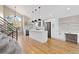 Beautiful open kitchen with an island, modern lighting, and stainless steel appliances at 6431 Freeport Dr, Highlands Ranch, CO 80130