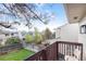 Private balcony overlooking a well-maintained backyard and neighborhood, offering a serene outdoor living space at 12606 Fairfax St, Thornton, CO 80241