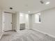 Carpeted bedroom with closet and a window allowing natural light at 1351 Brentwood St, Lakewood, CO 80214