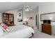 Bright bedroom boasts great natural light, neutral colors, and seamless flow at 5271 N Mesa Dr, Castle Rock, CO 80108