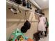 This walk-in closet features shelving for boot and shoe storage, as well as hanging rods at 5271 N Mesa Dr, Castle Rock, CO 80108