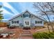 Charming home with a manicured lawn, complemented by a brick patio perfect for outdoor entertainment, with a mountain view at 5271 N Mesa Dr, Castle Rock, CO 80108