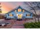 Charming home with a manicured lawn, complemented by a brick patio perfect for outdoor entertainment, with a mountain view at 5271 N Mesa Dr, Castle Rock, CO 80108