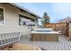 Inviting outdoor hot tub on a gray deck with a wood privacy fence at 5271 N Mesa Dr, Castle Rock, CO 80108