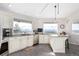 Kitchen features granite countertops, stainless steel appliances, and beautiful mountain views at 5271 N Mesa Dr, Castle Rock, CO 80108