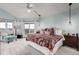 Bright bedroom features a private balcony access with gorgeous mountain views at 5271 N Mesa Dr, Castle Rock, CO 80108
