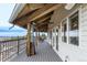Covered outdoor patio with a propane heater and a gorgeous view at 5271 N Mesa Dr, Castle Rock, CO 80108