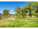 Relaxing park with benches and a path, offering a peaceful retreat in nature at 1183 S Pierson Ct, Denver, CO 80232