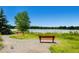 Enjoy the serene park with walking paths and benches near the tranquil lake at 1183 S Pierson Ct, Denver, CO 80232