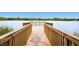 Well-maintained wooden pier offers a peaceful spot with open views of the water at 1183 S Pierson Ct, Denver, CO 80232