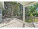 Spacious deck offers ample space for outdoor seating and entertaining with views of the backyard at 1183 S Pierson Ct, Denver, CO 80232