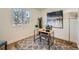 Bright home office with sleek desk, comfortable chair, modern art, and natural light at 1183 S Pierson Ct, Denver, CO 80232