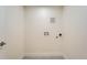 A utility room awaits appliances with all necessary connections at 1183 S Pierson Ct, Denver, CO 80232