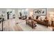 Stylish living room features cozy seating, light flooring, and modern decor at 1183 S Pierson Ct, Denver, CO 80232