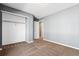 Bedroom with a closet, neutral walls, and carpet at 4935 S Zephyr St, Littleton, CO 80123