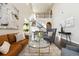 Bright and airy living room with vaulted ceilings and modern furnishings at 4935 S Zephyr St, Littleton, CO 80123