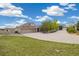 Charming single-Gathering home with a three-car garage, storage shed, concrete driveway and beautiful landscaping at 10044 E 146Th Pl, Brighton, CO 80602
