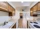 A view from the kitchen shows the fireplace in the living room at 14720 E Kentucky Dr # 625, Aurora, CO 80012